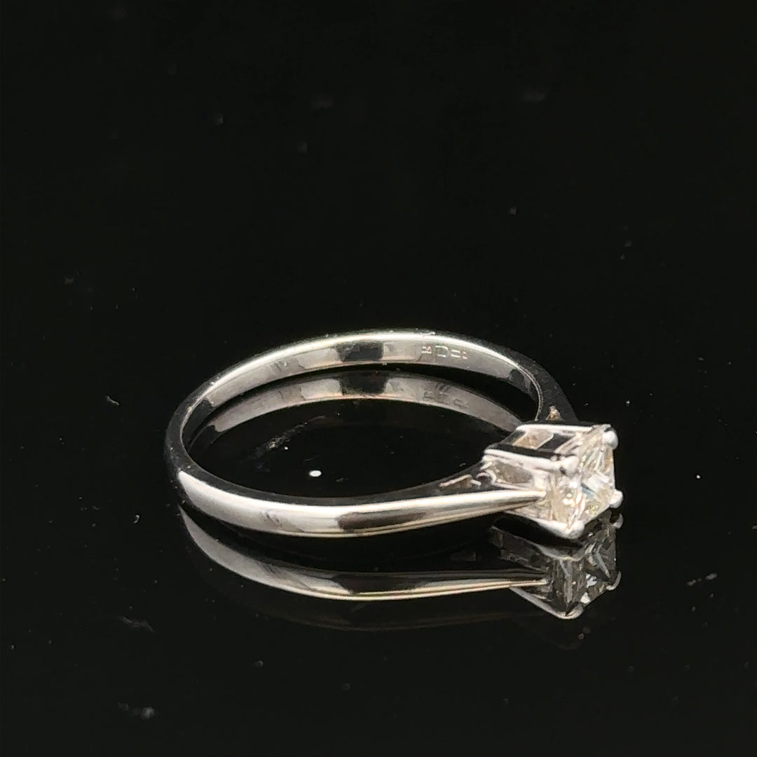 18ct yellow gold diamond ring with a 1/3 carat princess cut diamond, size M, featuring elegant, classic jewelry design.