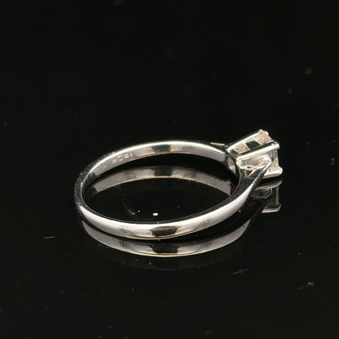18ct yellow gold diamond ring with a 1/3 carat princess cut solitaire, size M, unbranded jewelry accessory.