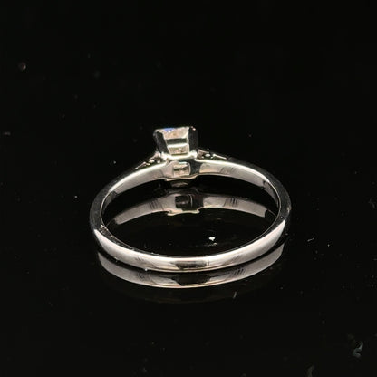 18ct yellow gold diamond ring with 1/3 carat princess cut diamond, size M, elegant jewelry piece.