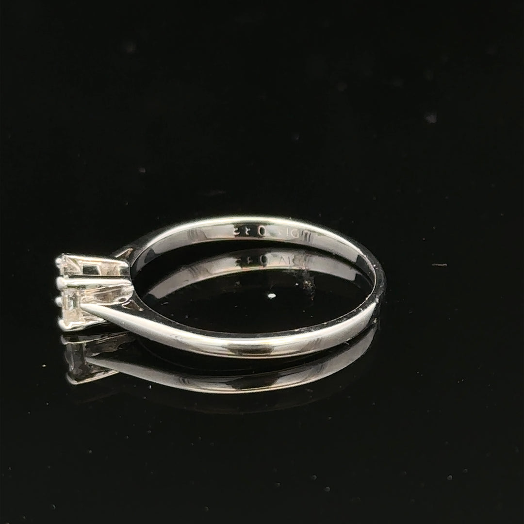 18ct yellow gold diamond ring with a 1/3 carat princess cut diamond, size M, showcasing elegant jewelry craftsmanship.