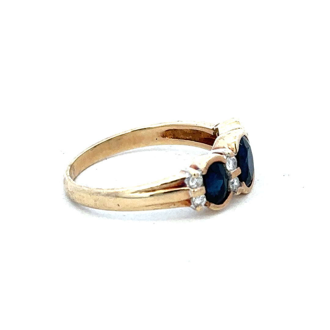 9ct yellow gold diamond ring in size L1/2 with intricate design, crafted by Reeves and Sons, featuring sparkling diamonds.