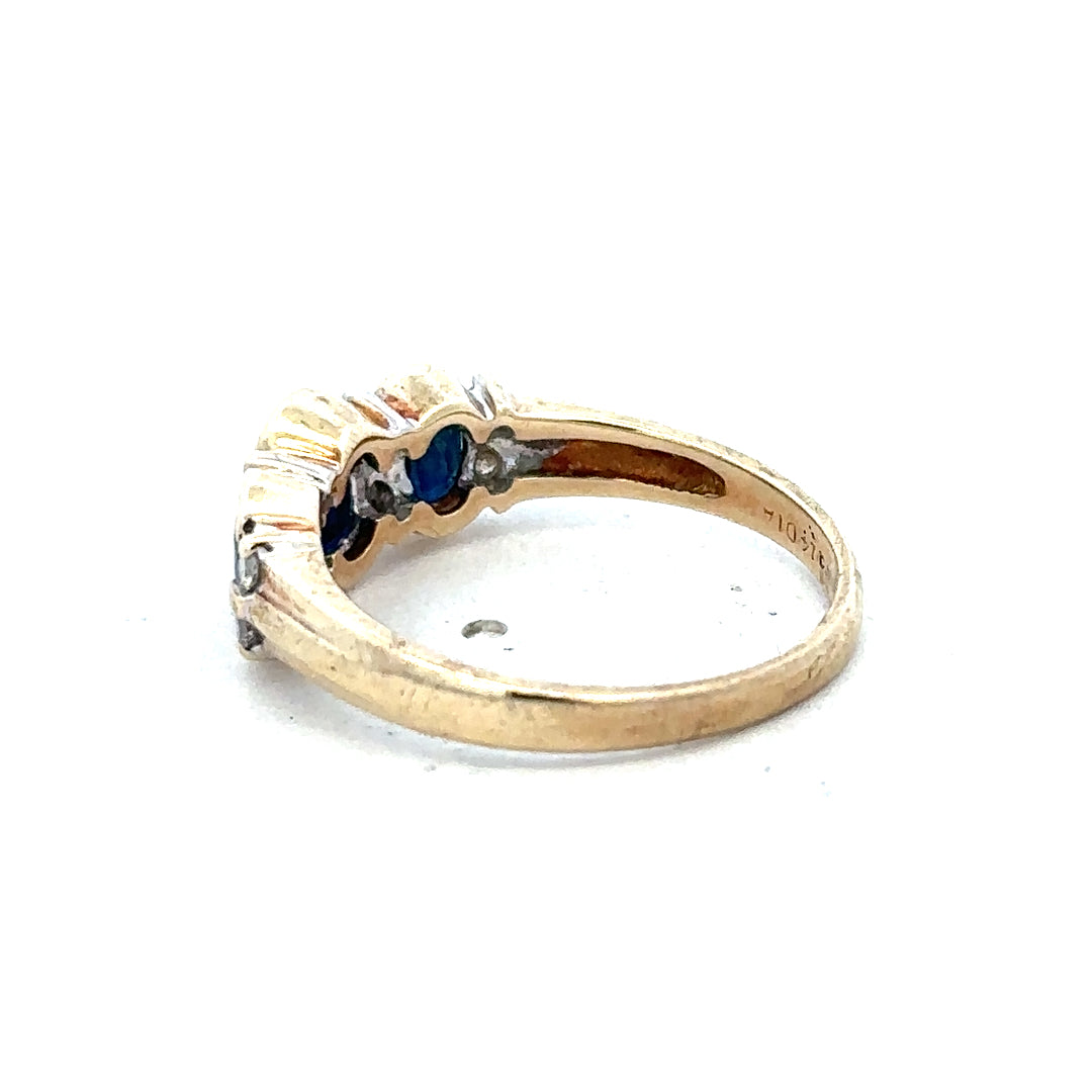 9ct yellow gold diamond ring size L1/2 with sparkling diamonds, crafted by Reeves and Sons, showcasing intricate design details.