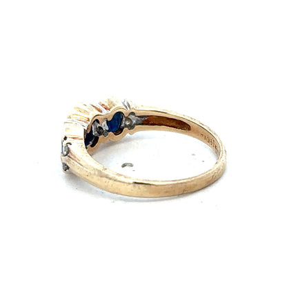 9ct yellow gold diamond ring size L1/2 with sparkling diamonds, crafted by Reeves and Sons, showcasing intricate design details.