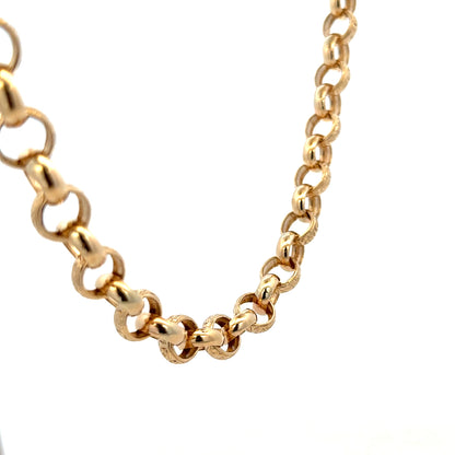 9ct yellow gold belcher chain from Reeves and Sons, showing the chain's links and polished finish.