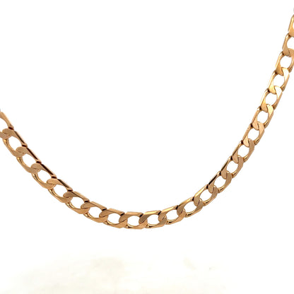 9ct yellow gold curb chain weighing 27.6g, crafted by Reeves and Sons, displayed with close-up of the chain links.