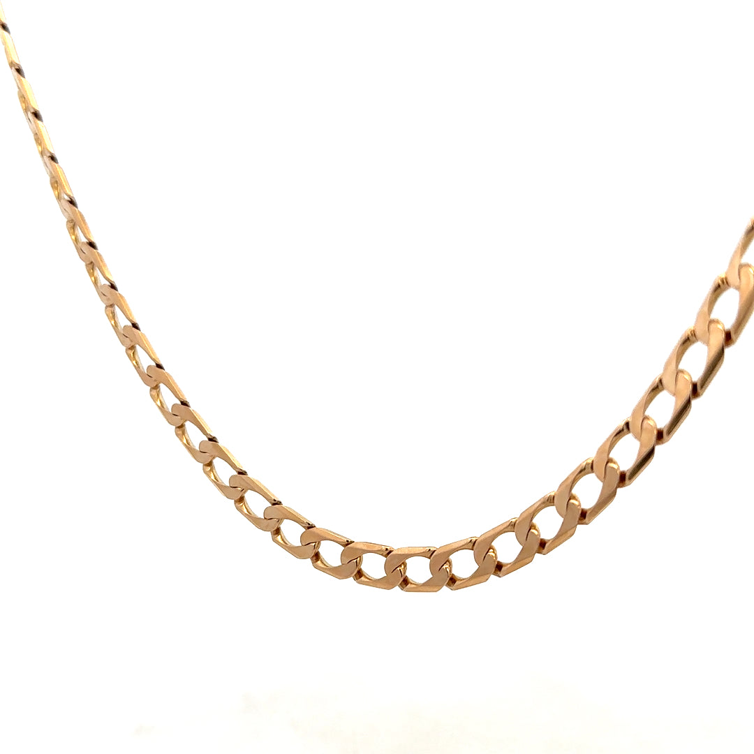 9ct yellow gold curb chain from Reeves and Sons, 27.6g, showcasing polished links against a neutral background.