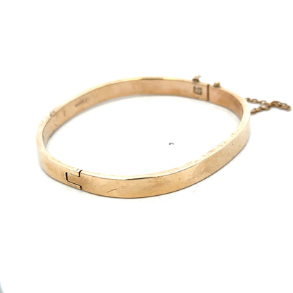 Reeves and Sons 9ct yellow gold bracelet bangle weighing 24.1g, smooth polished surface, stylish jewelry accessory