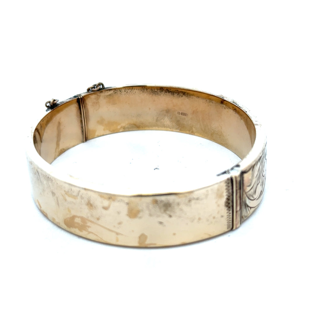 Reeves and Sons 9ct yellow gold bracelet bangle, 22.7g, with a smooth, polished finish and classic design.