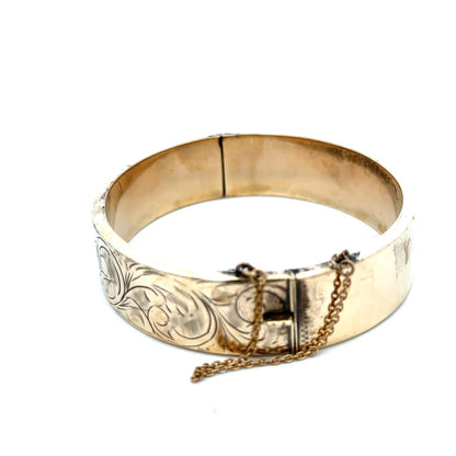 Reeves and Sons 9ct yellow gold bracelet bangle, 22.7g, with smooth polished finish and classic design.