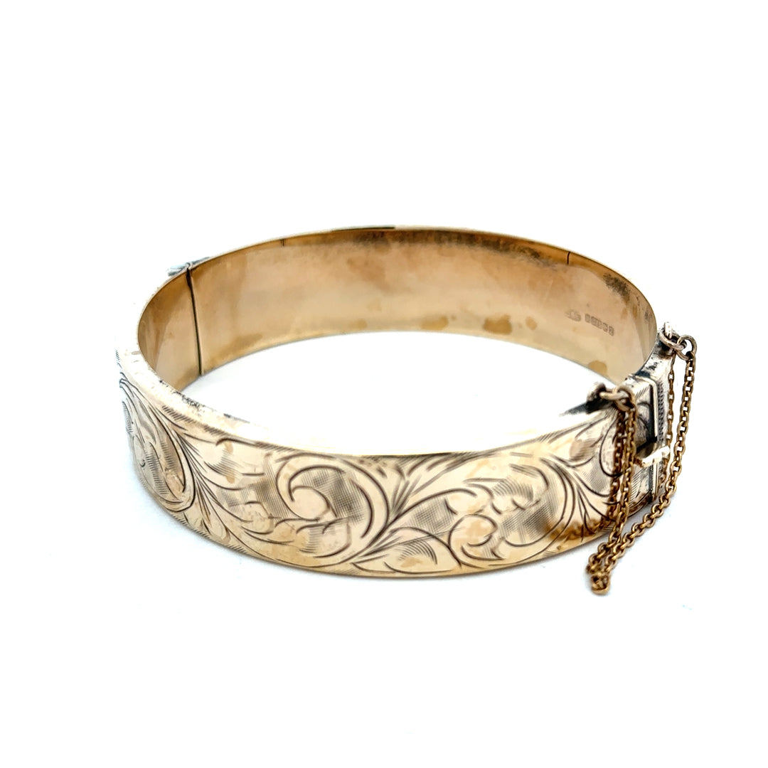 Reeves and Sons 9ct yellow gold bracelet bangle, 22.7g, with smooth polished finish and classic design.
