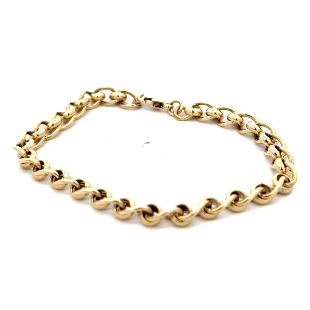 9ct yellow gold rollerball bracelet by Reeves and Sons, featuring smooth spherical gold beads, weight 13.2g.