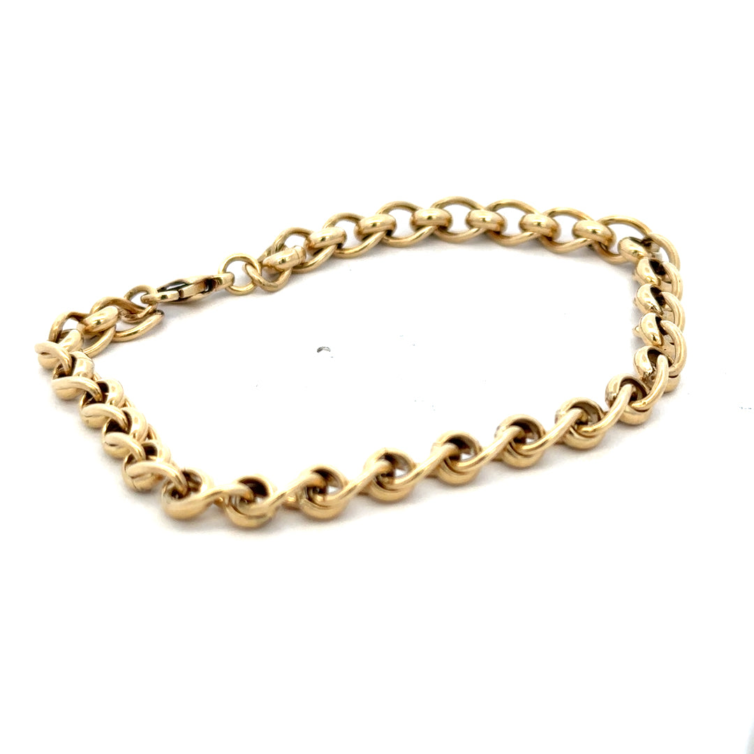 9ct yellow gold rollerball bracelet by Reeves and Sons with a sleek design, weighing 13.2g, showcased in a close-up image.