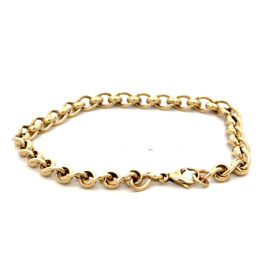 9ct yellow gold rollerball bracelet by Reeves and Sons, showcasing smooth spherical gold beads on a delicate chain.