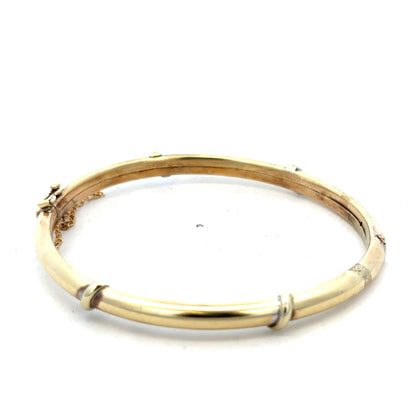 Reeves and Sons 9ct yellow gold bracelet bangle with smooth polished finish, weighing 11.1g, elegant jewelry accessory