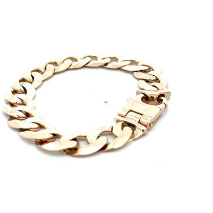 Reeves and Sons 9ct yellow gold curb bracelet with solid links, weighing 48.1g, displayed on a neutral background.