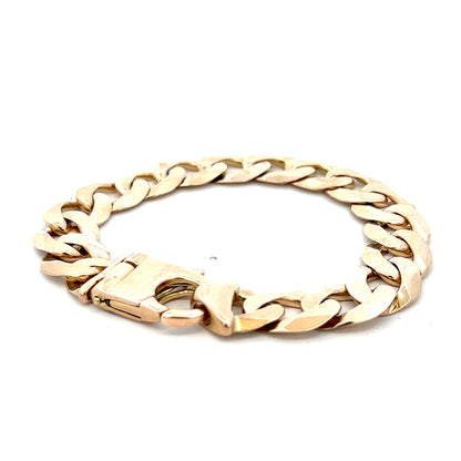 9ct yellow gold curb bracelet with intricate links, weighs 48.1g, from Reeves and Sons.