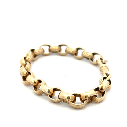 9ct yellow gold belcher bracelet with textured links, weighing 21.7g, crafted by Reeves and Sons.