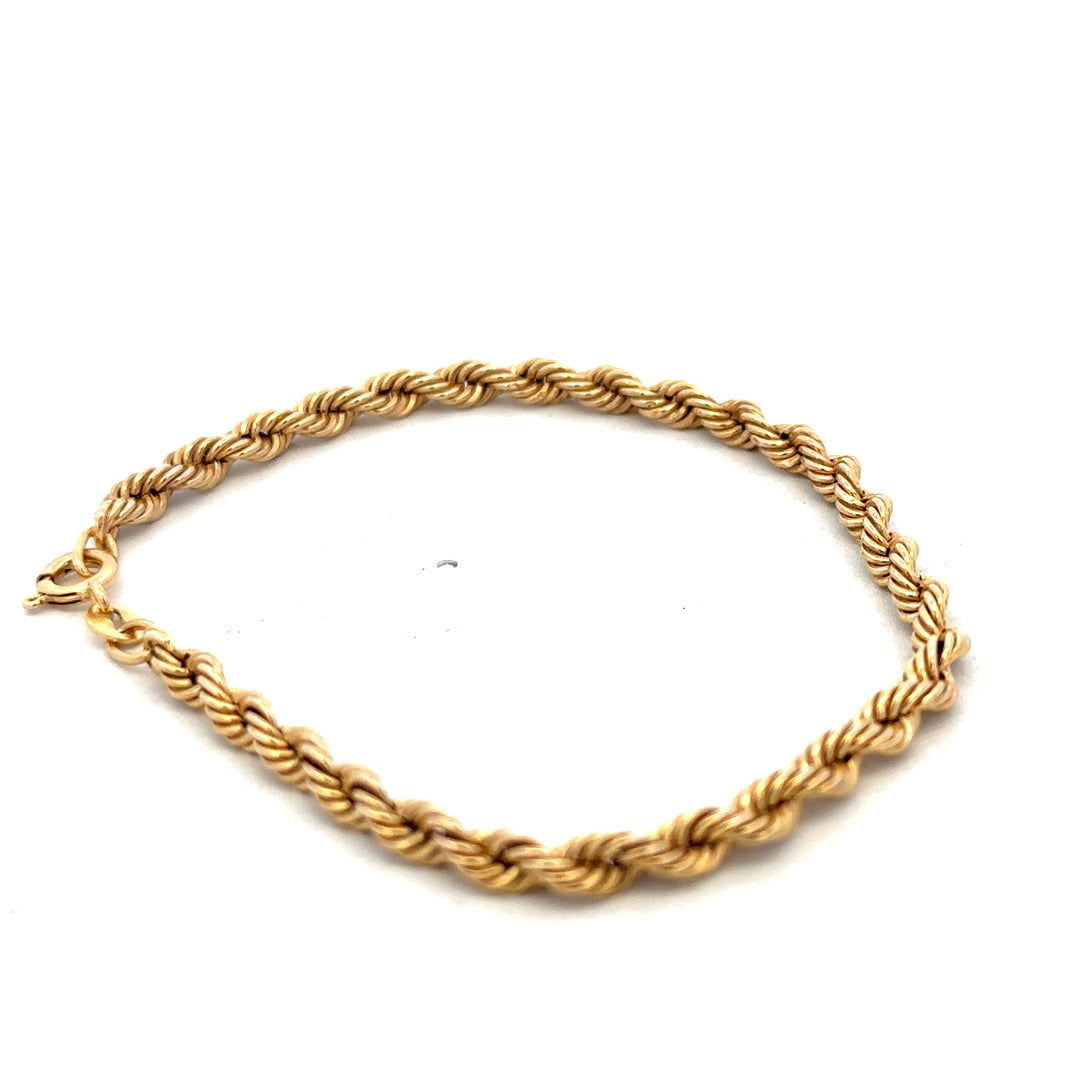9ct yellow gold rope bracelet weighing 2.4g, Reeves and Sons jewelry, featuring twisted gold rope design and secure clasp.