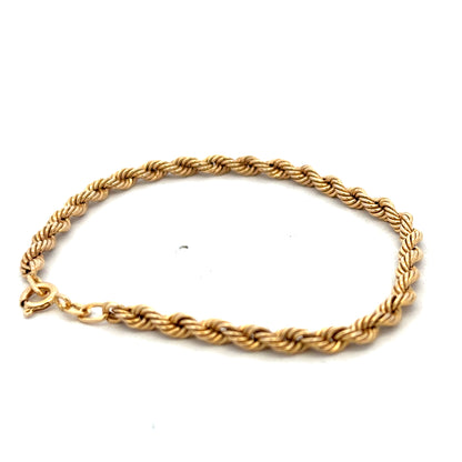 9ct yellow gold rope bracelet weighing 2.4g with a detailed twisted design, crafted by Reeves and Sons.