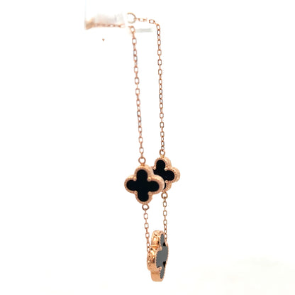 14ct gold bracelet by Reeves and Sons with a delicate chain and subtle shine, weighing 3.4 grams.