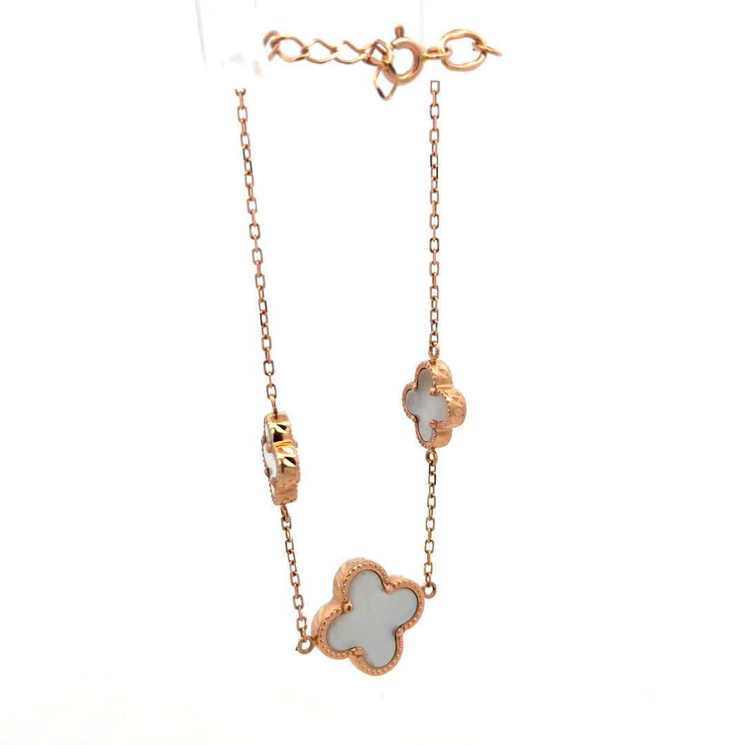 14ct gold bracelet by Reeves and Sons, 3.4g, featuring a delicate chain design, shown in close-up detail.