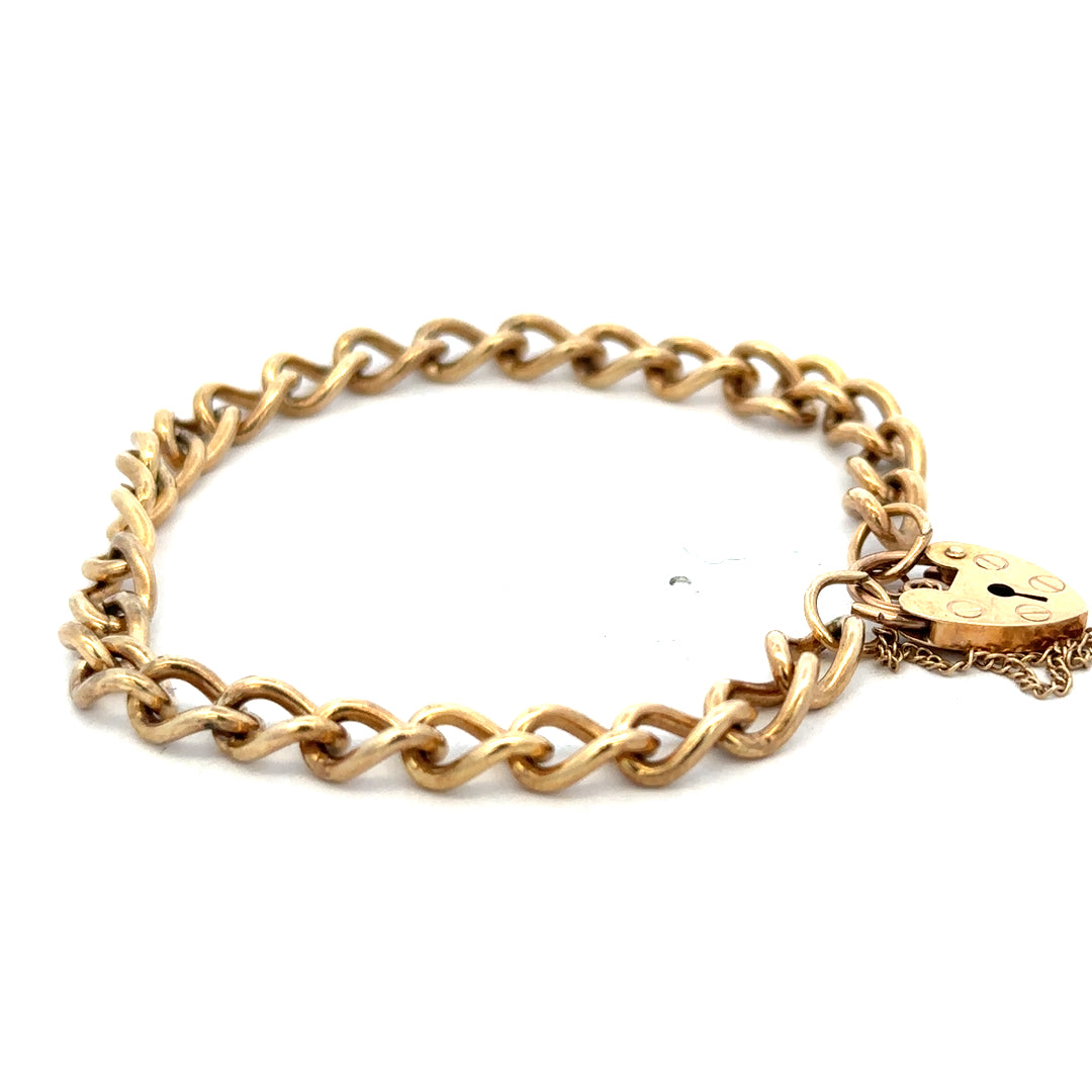 9ct yellow gold bracelet with intricate link design, weighing 13.2g, from Reeves and Sons.