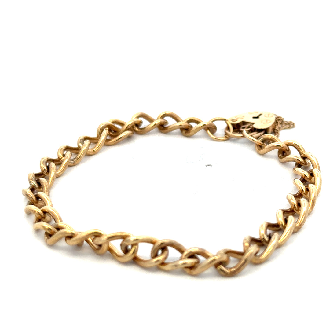 9ct yellow gold bracelet weighing 13.2g from Reeves and Sons, featuring a delicate chain design, shown close-up.