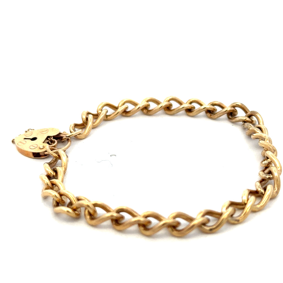 Reeves and Sons 9ct yellow gold bracelet weighing 13.2g, featuring a classic chain design, shown in close-up.