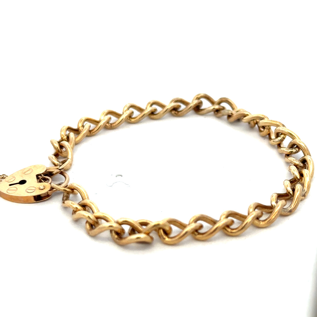 9ct yellow gold bracelet weighing 13.2g from Reeves and Sons, featuring a sleek, polished design with intricate link details.
