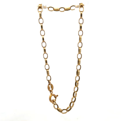 9ct yellow gold belcher bracelet from Reeves and Sons, featuring interlinked chain links and a polished finish.
