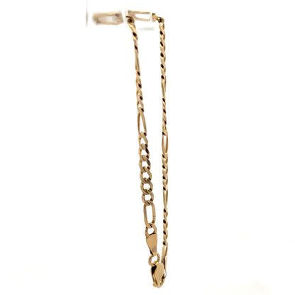 9ct yellow gold Figaro bracelet by Reeves and Sons, showcasing linked chain design and polished finish.