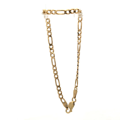 9ct yellow gold Figaro bracelet with linked chain design and polished finish, weighing 4.2g, by Reeves and Sons.
