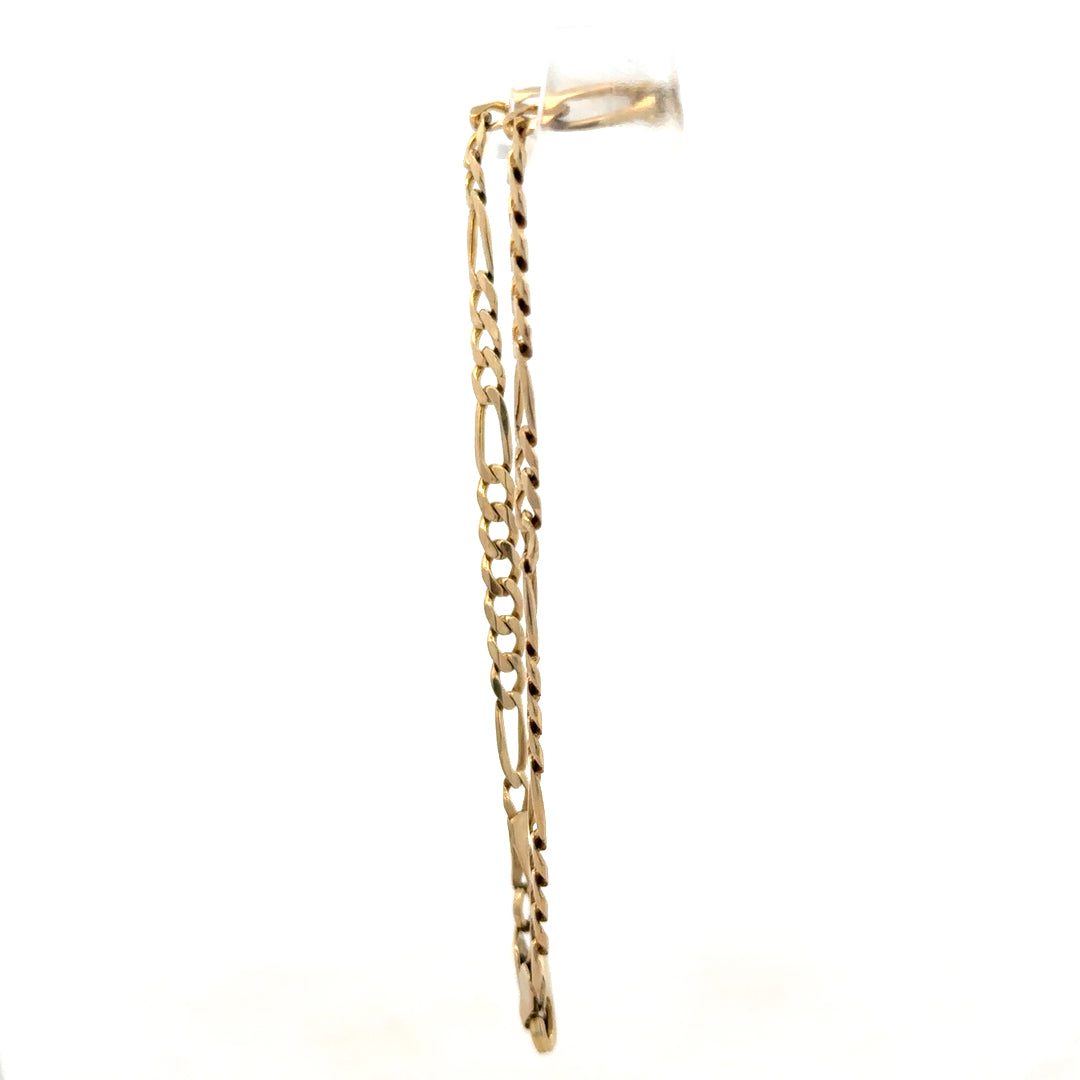 9ct yellow gold figaro bracelet weighing 4.2g with detailed chain links, crafted by Reeves and Sons.