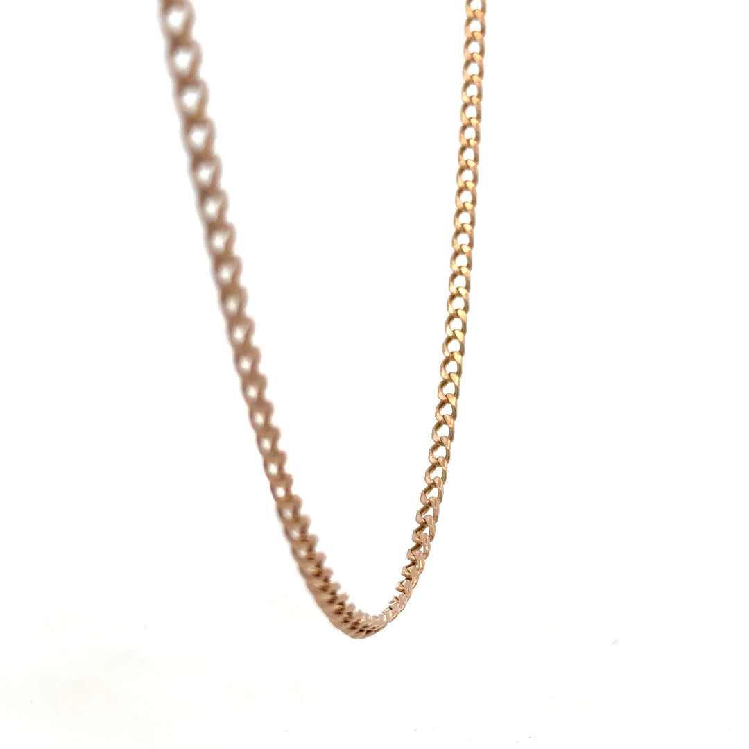 9ct yellow gold chain from Reeves and Sons, 15.8g, showcasing a detailed close-up of the elegant jewelry link design.