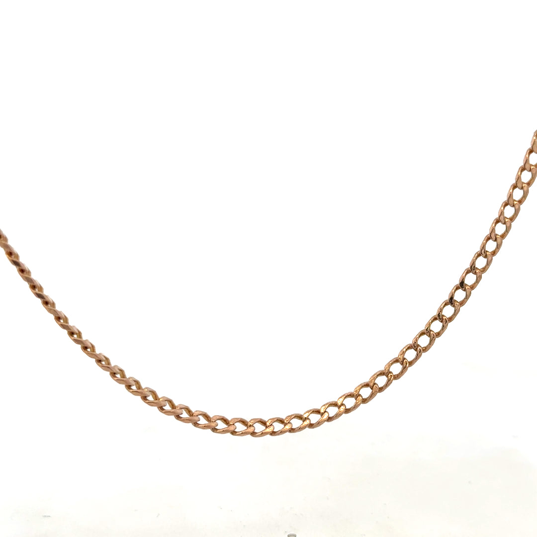 9ct yellow gold chain weighing 15.8g from Reeves and Sons, showing a close-up of the elegant jewelry link design.