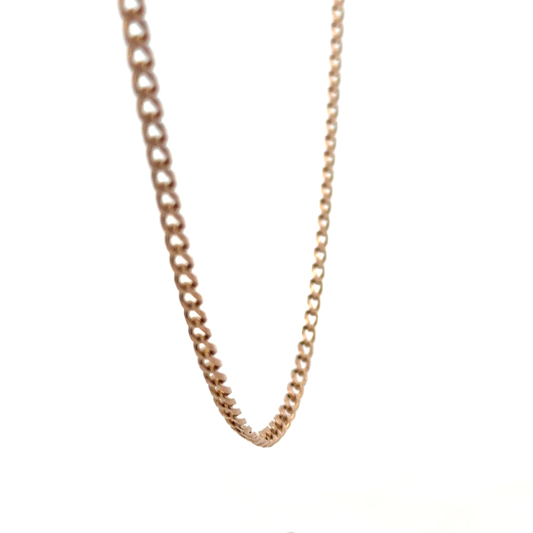 9ct yellow gold chain with a smooth link design, weighing 15.8 grams, from Reeves and Sons.