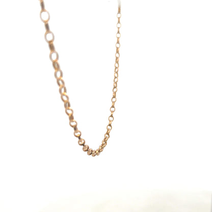 9ct yellow gold belcher chain from Reeves and Sons, showing the textured link design and shiny finish.