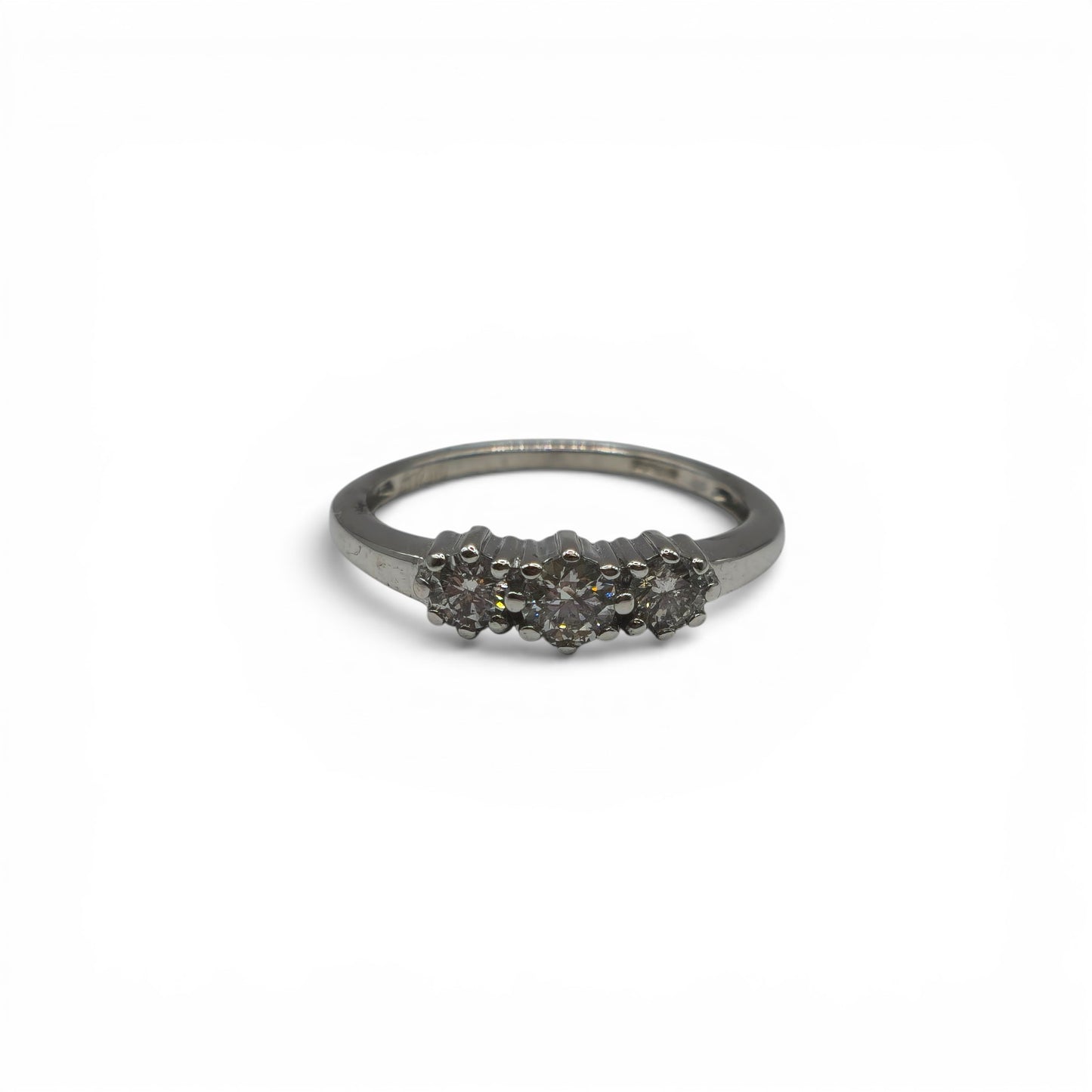 18ct white gold diamond ring by Reeves and Sons with sparkling diamonds, showcasing elegant jewelry design.