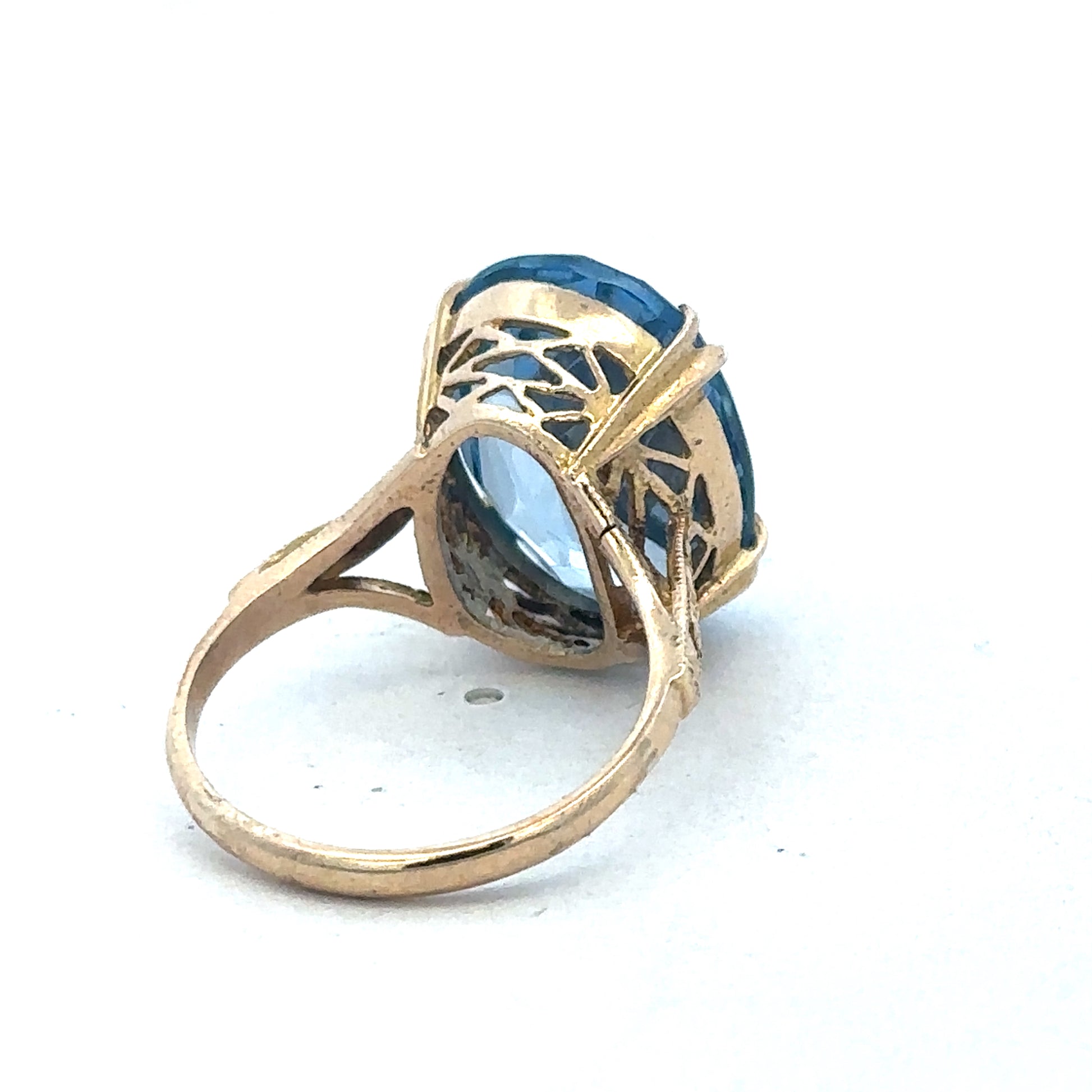 9ct yellow gold ring by Reeves and Sons, showcasing a sleek and elegant design with a polished finish.