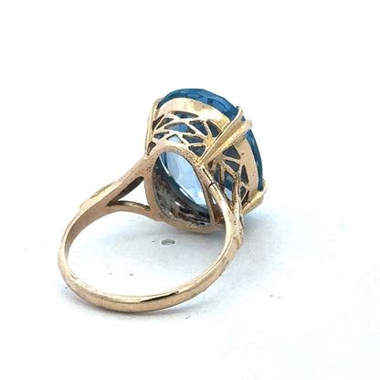 9ct yellow gold ring by Reeves and Sons, showcasing a sleek and elegant design with a polished finish.