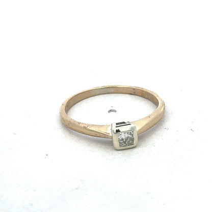 9ct yellow gold diamond ring by Reeves and Sons, featuring a sparkling diamond centerpiece and elegant band design.