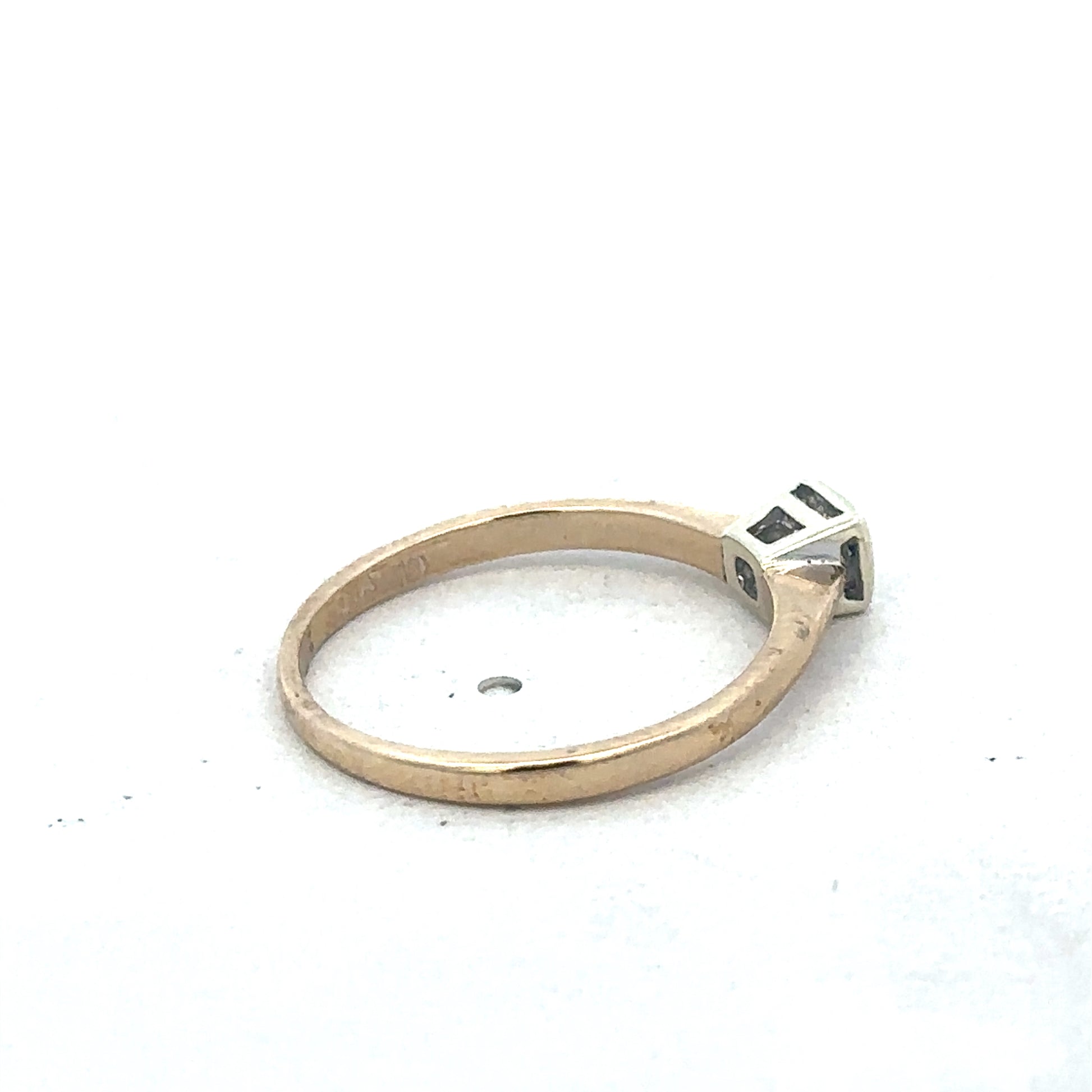 9ct yellow gold diamond ring by Reeves and Sons, showcasing a sparkling diamond set in a sleek gold band.