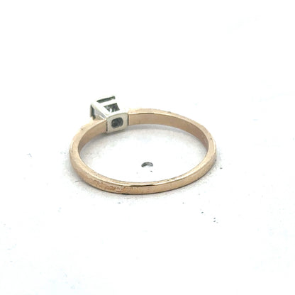 9ct yellow gold diamond ring by Reeves and Sons featuring a sparkling diamond set in a classic band.