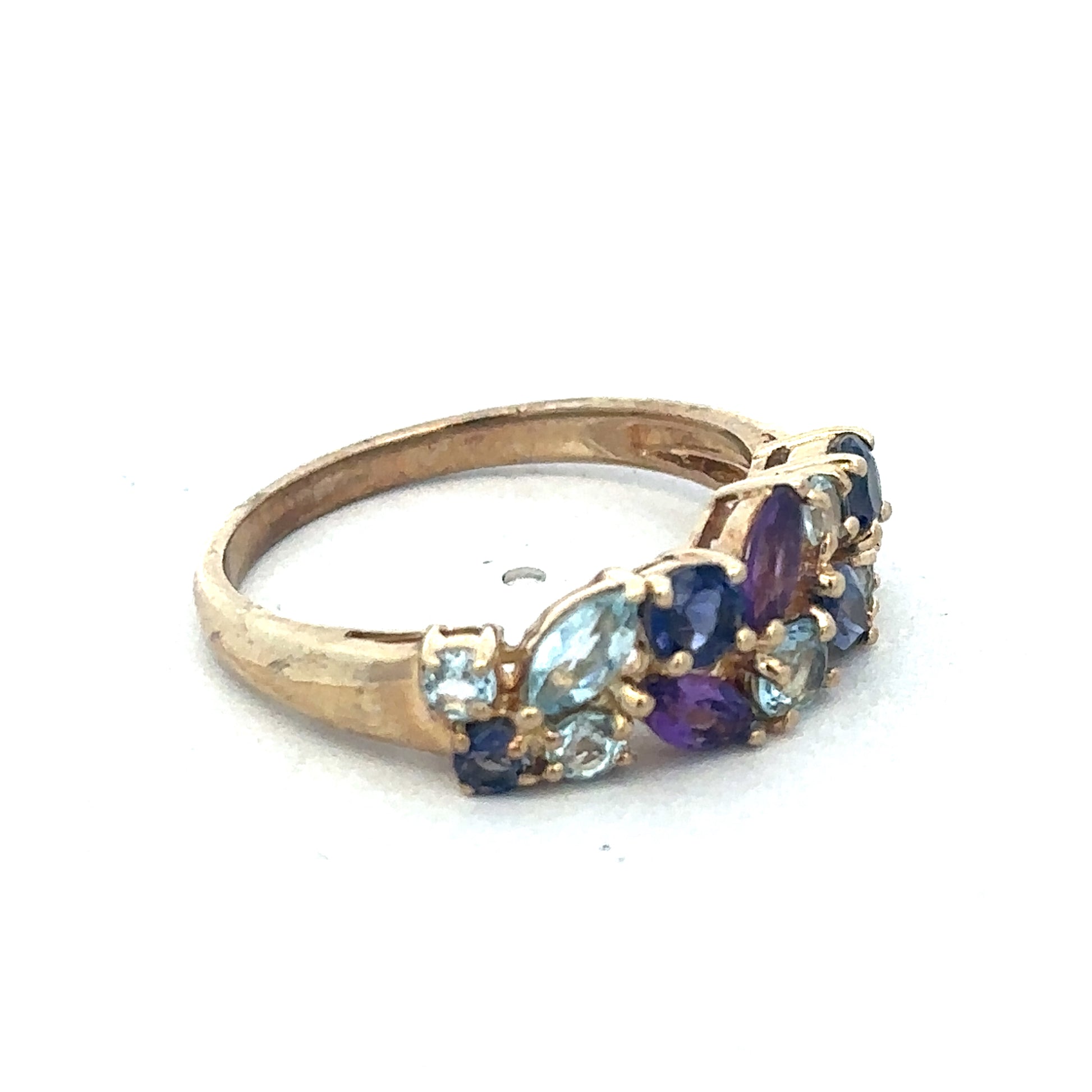 9ct yellow gold gemstone ring by Reeves and Sons, featuring a polished band and a central gemstone.