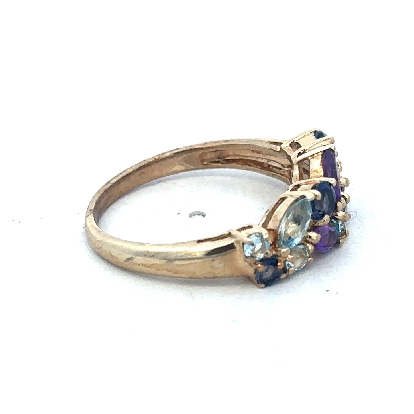 9ct yellow gold gemstone ring by Reeves and Sons featuring a sparkling central gemstone and elegant band design.