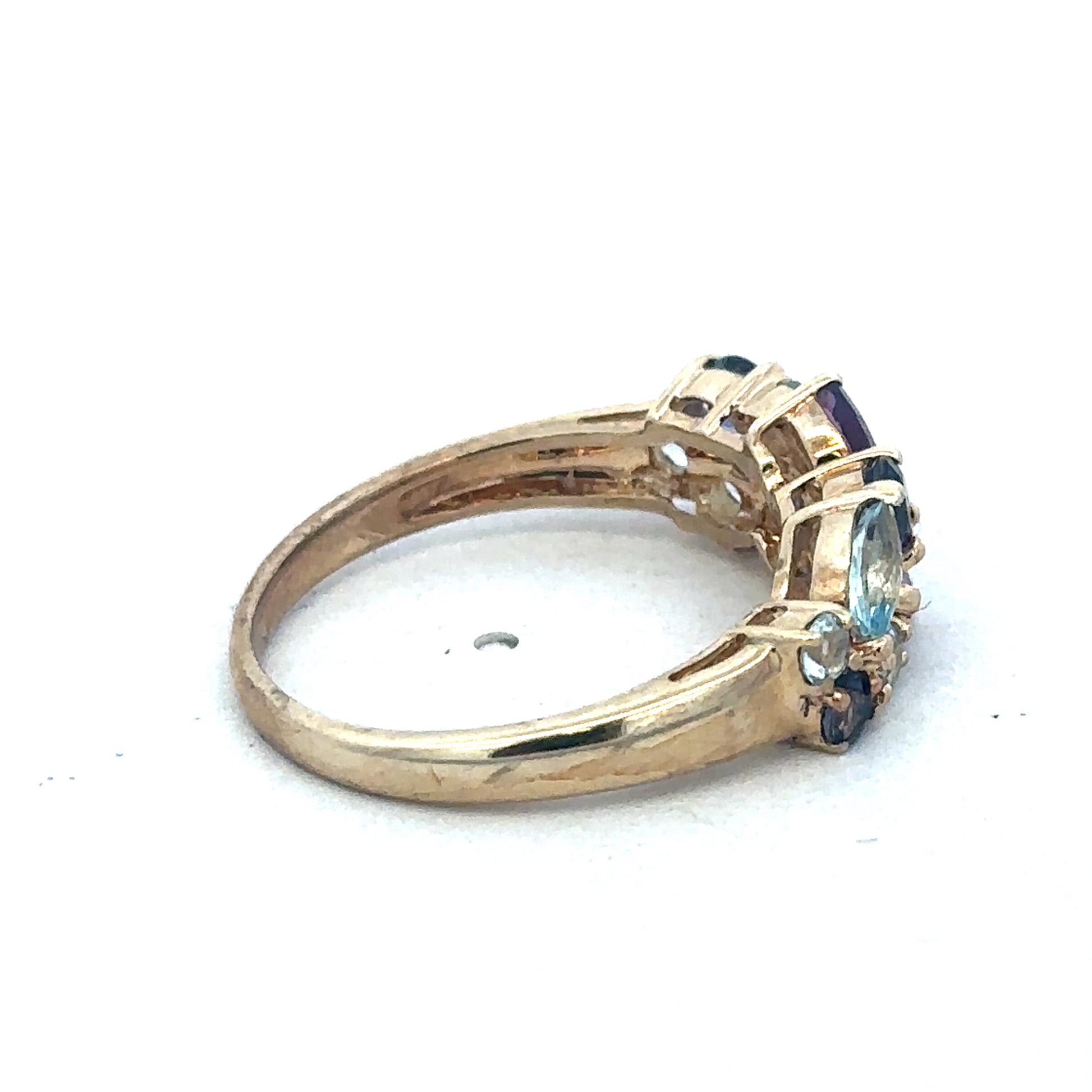 9ct yellow gold gemstone ring by Reeves and Sons, featuring a polished band with a prominent gemstone centerpiece.