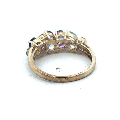 9ct yellow gold gemstone ring by Reeves and Sons featuring a central gemstone set in a polished band.