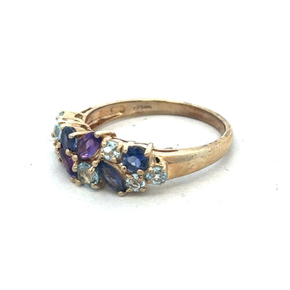 9ct yellow gold gemstone ring by Reeves and Sons, featuring a central gemstone and intricate band design.