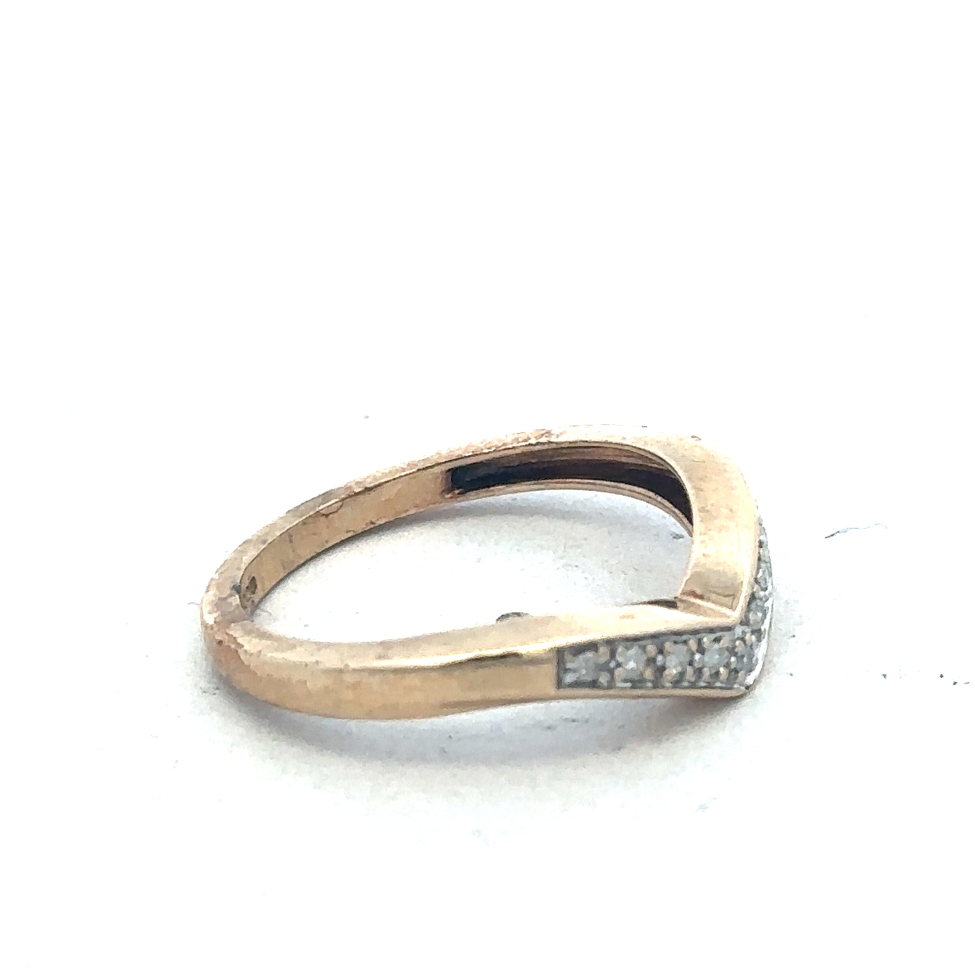 9ct yellow gold diamond wishbone ring by Reeves and Sons, featuring a delicate design with sparkling diamonds.