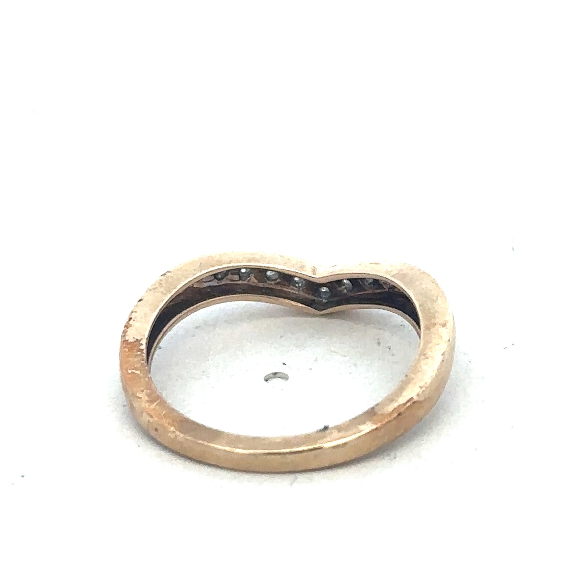 9ct yellow gold diamond wishbone ring by Reeves and Sons, featuring sparkling diamonds and a classic wishbone design.